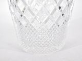 a clear glass vase with a diamond pattern on it