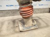 a fire hydrant that is sitting on top of a cement block