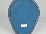 a blue case sitting on top of a white table