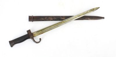 an old knife and a small knife on a white surface