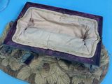 an old suitcase that is sitting on a table