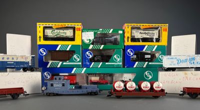 a lot of toy trains that are lined up together