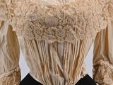 an image of a woman ' s blouse on a mannequin
