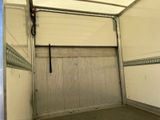 a garage door with a handle in the middle of it
