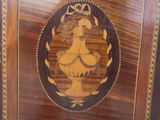 a wooden cabinet with a picture of a horse on it