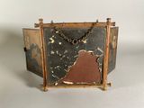 a small wooden box with a chain hanging from it