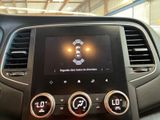 a picture of a car dashboard with a clock on it