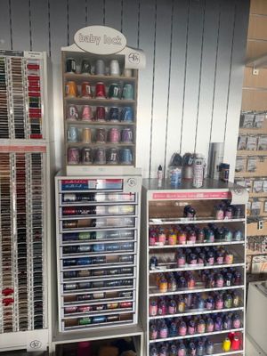 a lot of craft supplies on the shelves in the store