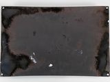 an image of a piece of metal with rust on it
