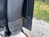 a close up view of a motorcycle with the door open