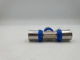 a close up of a metal pipe with a blue rubber band