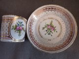 an image of a cup and saucer sitting on top of a table
