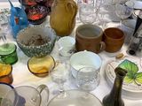 a table with a lot of glass items on it