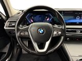 the interior of a bmw vehicle with a steering wheel and dashboard