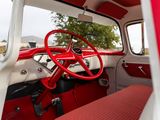 a red and white car with a red steering wheel