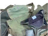 many different types of bags that are sitting on the floor