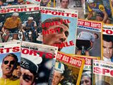 a lot of sports magazines on the table