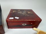 a wooden box and a wooden spoon on a table
