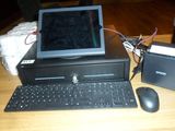 a desktop computer sitting on top of a wooden desk