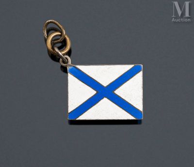 a silver and blue scottish flag charm on a black background