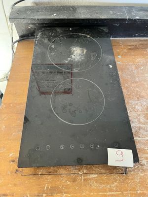 an image of a stove top with a black burner on it