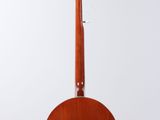 a close up of a guitar hanging from a string