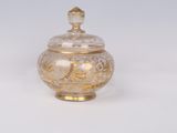 an image of a glass jar with a lid on a white surface