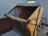 a large metal container sitting on the ground