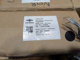 a cardboard box with a sticker on it sitting on a table