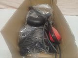 a cardboard box with a pair of headphones inside of it