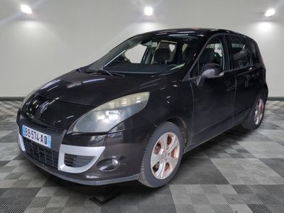 a picture of a black car parked in a garage