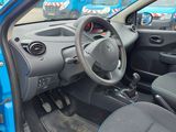 a small blue car with a steering wheel and dashboard
