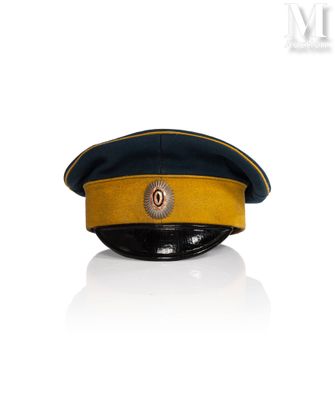 an image of a yellow and black hat on a white surface