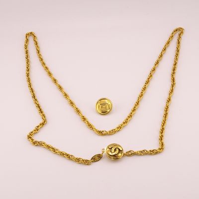 a gold plated necklace with a chain and a clasp