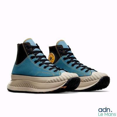 nike air force high top sneakers in blue and black with a yellow logo on the side