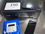 an image of a printer and a cell phone on a table
