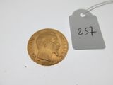 a close up of a coin with a price tag on it