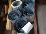 many different types of duct pipes on a pallet