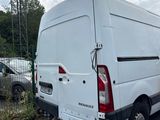 a white van that is parked in the parking lot