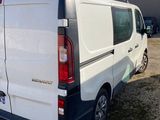 a white van that is parked in a parking lot