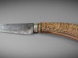 a knife that is sitting on top of a table