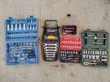 a lot of tools that are laying out on the floor