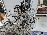 a chandelier that has a lot of glass hanging from it