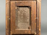 a picture of a wooden frame with a picture in it
