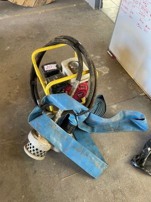a picture of a blue and yellow machine on the ground