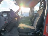 a view of the inside of a vehicle from the driver ' s seat