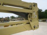 a close up of a fork on the back of a construction vehicle