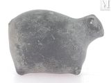 an image of a stone animal statue on a white surface