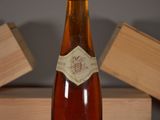 a bottle of wine that is sitting on a table