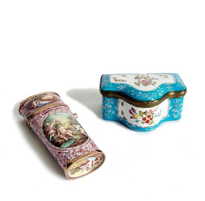 two boxes that are sitting side by side on a white surface